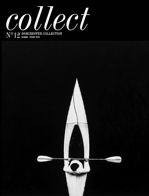 黑色表面上的白色独木舟是本周《收藏》杂志的封面