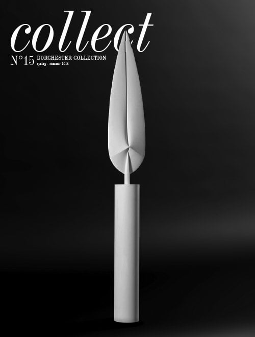 白色折纸蜡烛火焰照亮了《收藏》杂志封面
