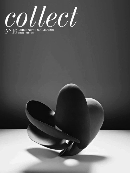 白色表面上的黑色花卉雕塑是本期《收藏》杂志的封面图片